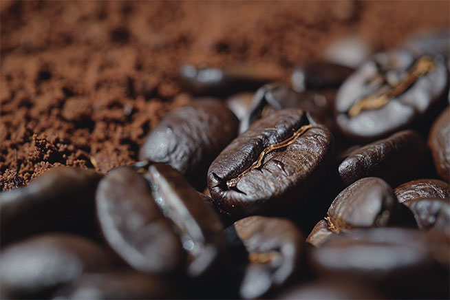 raw image Close up of coffee beans and ground coffee