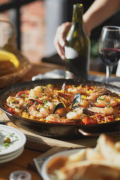 raw image Spanish paella in a pan