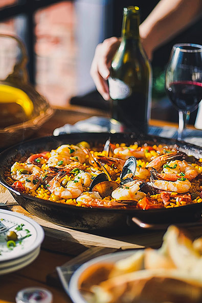 with preset Spanish paella in a pan