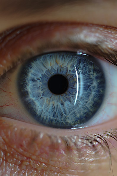 Before close-up photograph of a blue human eye