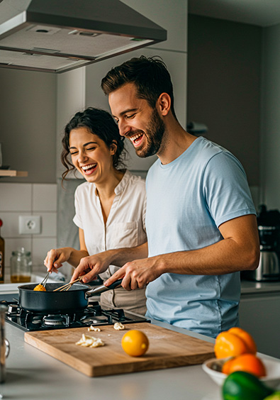 Kodachrome 25 example image - couple in their thirties, cooking together in a modern kitchen