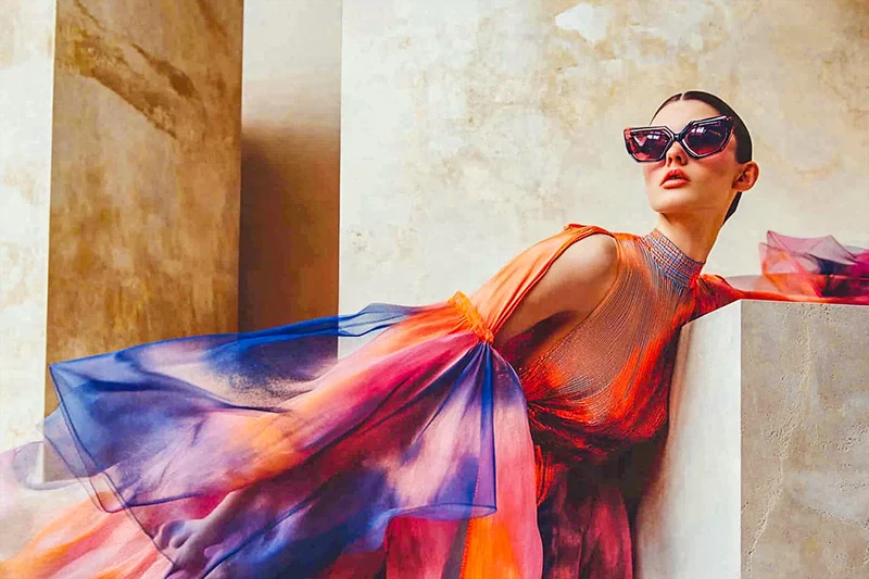 With preset applied - russian model wearing a bold, avant-garde outfit with dramatic sleeves