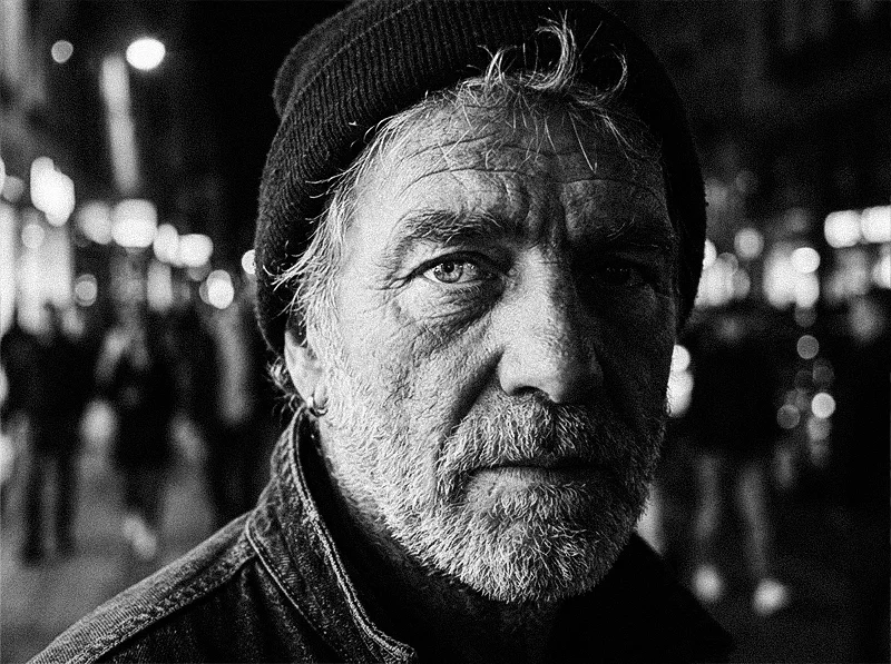 Close-up of Kodak TRI-X 400 grain character on street portrait in Lightroom