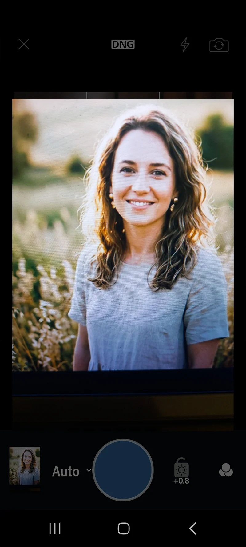 Lightroom Mobile camera interface showing DNG RAW format selected in settings