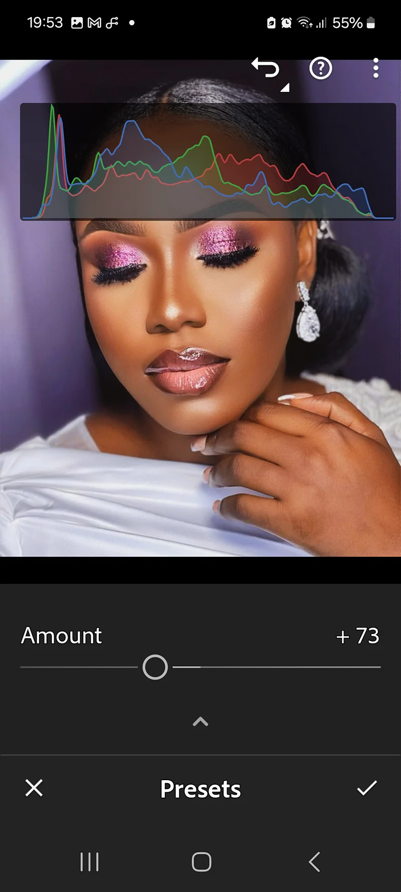 Lightroom Mobile showing Preset Amount slider set to 75% on a portrait with film preset applied