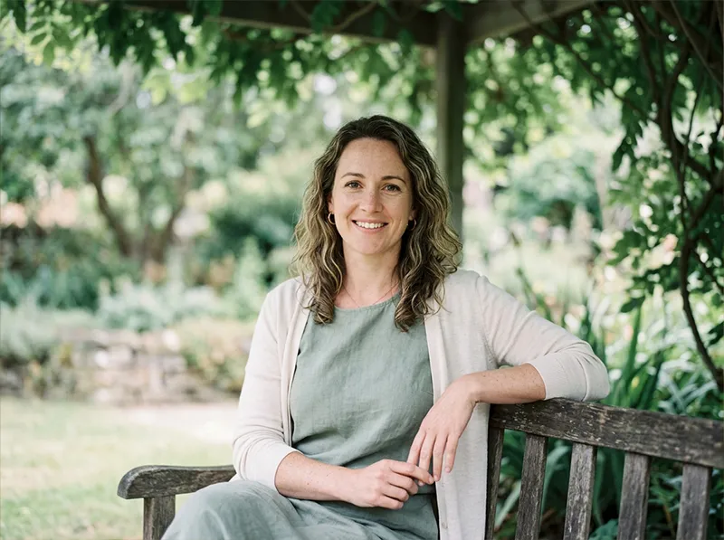 Portrait in open shade processed with Fujifilm Pro 400H Lightroom preset showing pastel cool skin tones